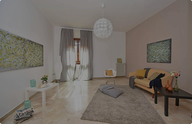 Living room lit by harsh artificial light